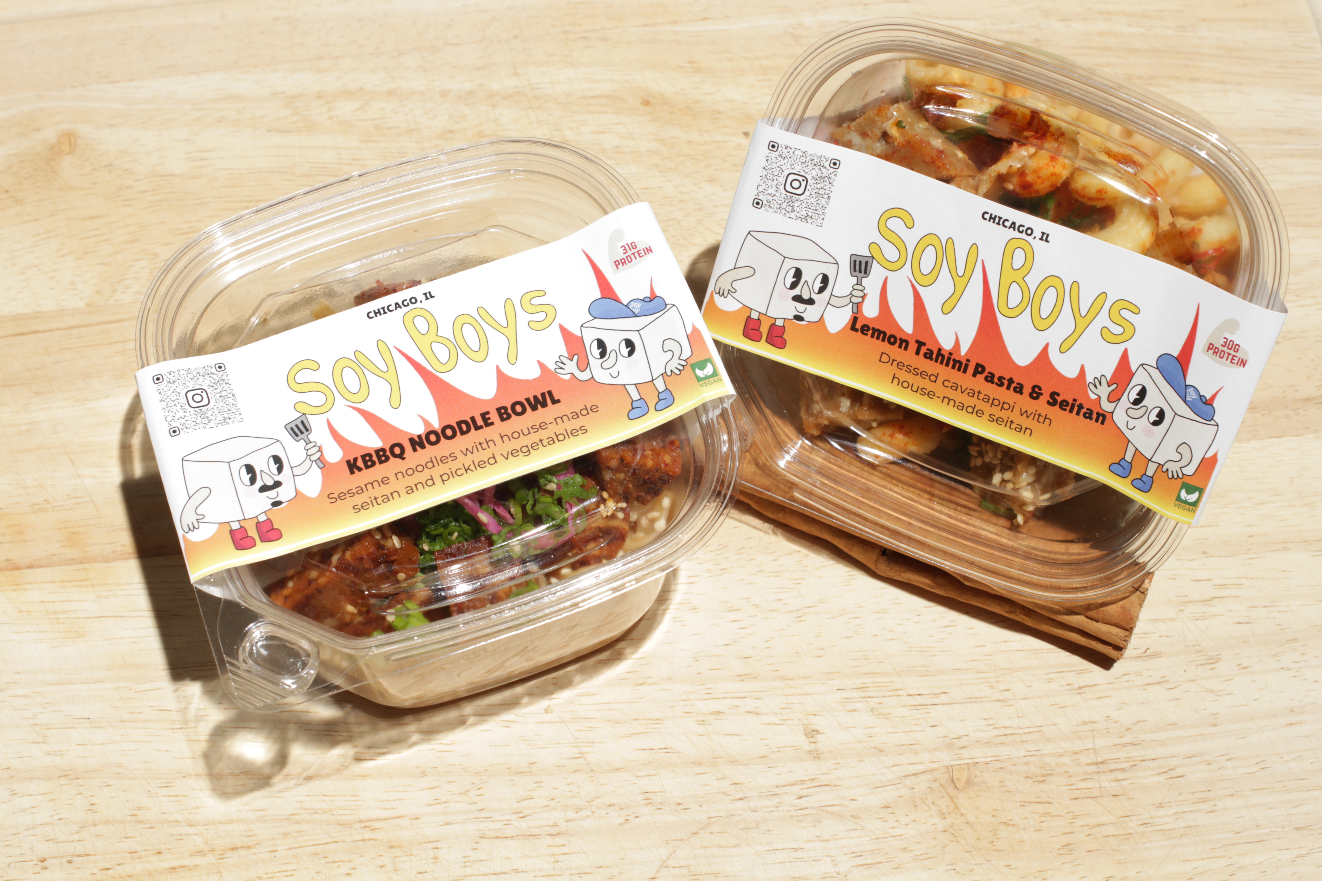 Lemon Tahini Pasta and Korean BBQ Bowl in Soy Boys meal boxes